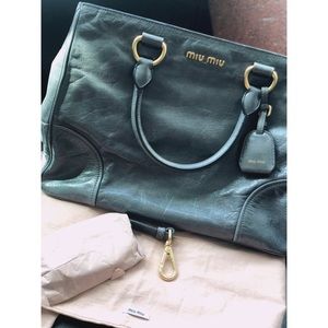 Miu Miu Leather Tote handbag with card and dustbag